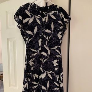 Medium length formal dress.